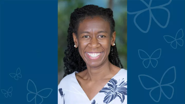 Professional headshot of Ashaunta Anderson, MD, MPH, MSHS against blue letterbox background